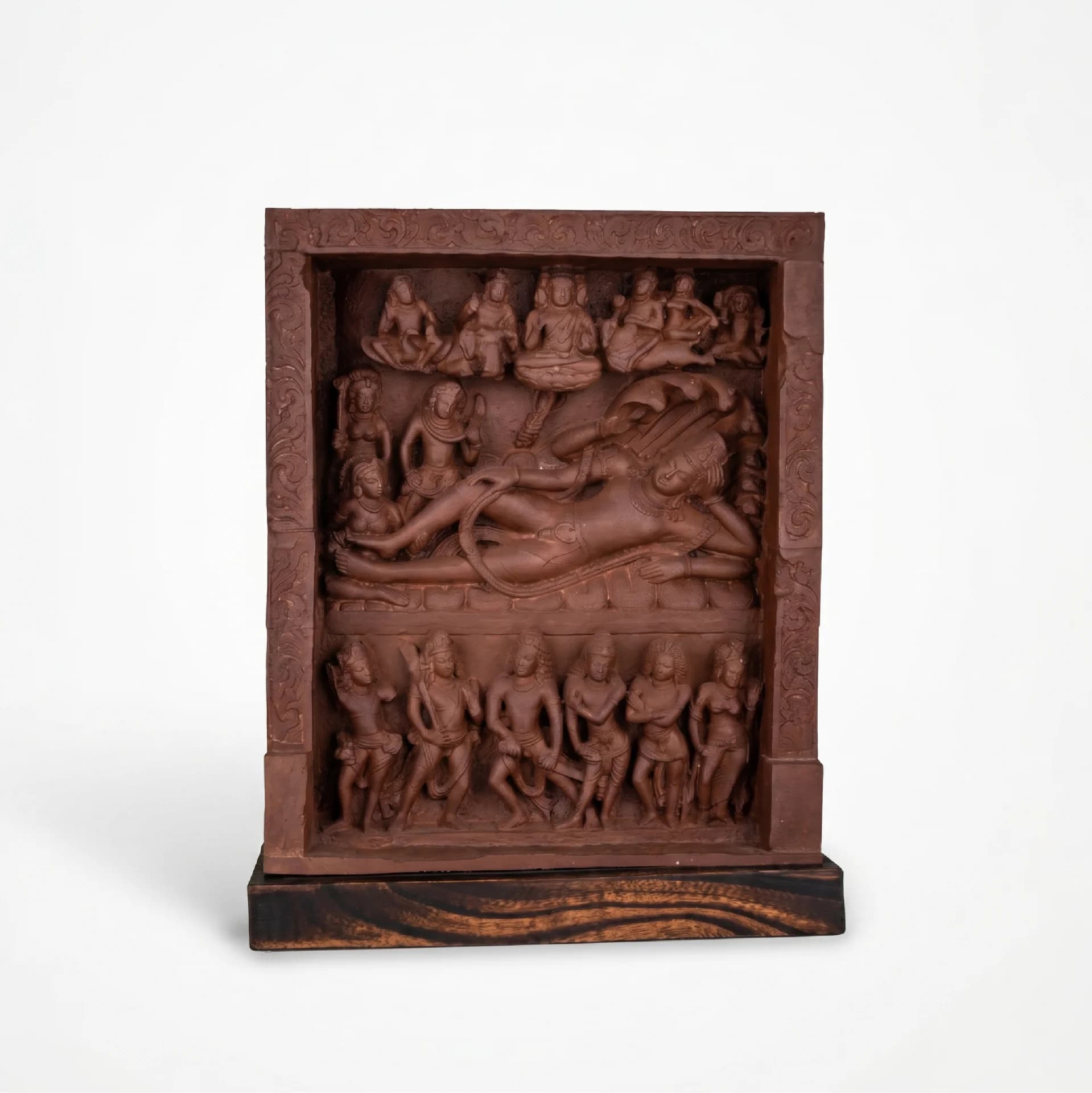 A front-facing view of the Anantasayana Vishnu Sculpture, a terracotta-style relief panel showing the deity reclining on a serpent.