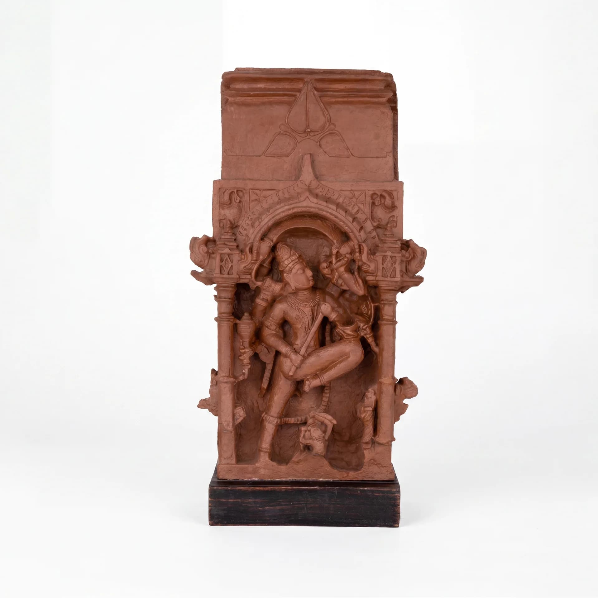 A full front view of the Gajasura Vadha Sculpture, a stone composite temple relief replica depicting Shiva slaying the demon.