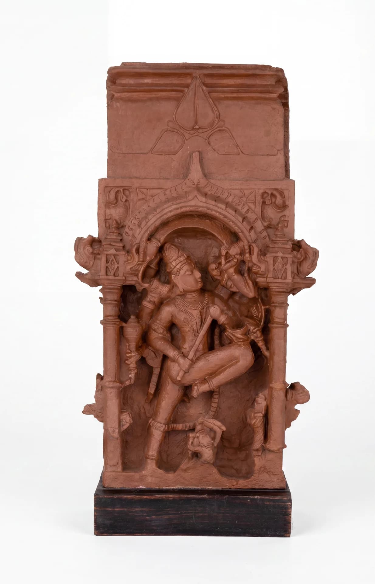 A full front view of the Gajasura Vadha Sculpture, a stone composite replica featuring intricate temple relief carvings of Shiva.