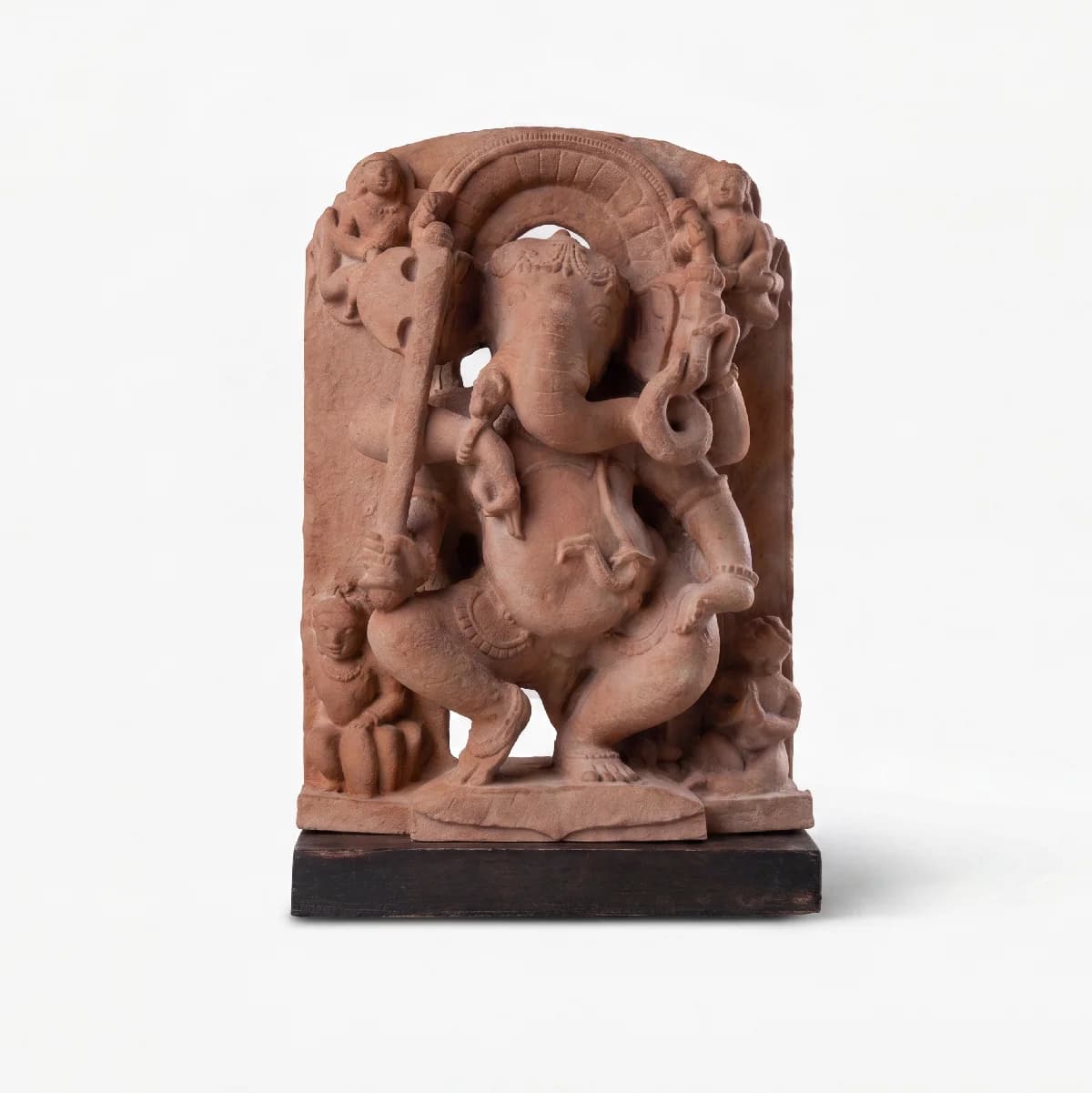 A detailed terracotta-style Ganesha Sculpture replica featuring intricate temple carvings of the deity standing on a dark wooden base.