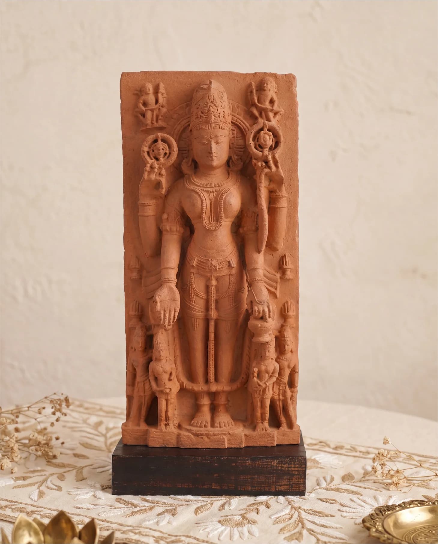 A front-facing view of the Gauri Parvati Sculpture, a detailed stone composite replica of a 10th-century Hindu temple artifact.