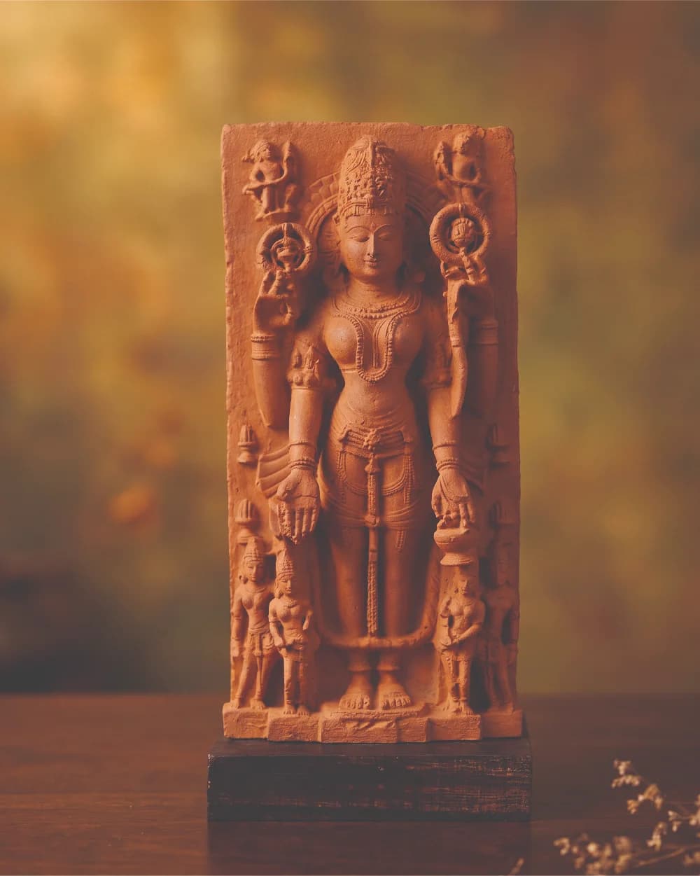 A front-facing view of the Gauri Parvati Sculpture, a hand-finished stone composite replica featuring intricate 10th-century temple art details.