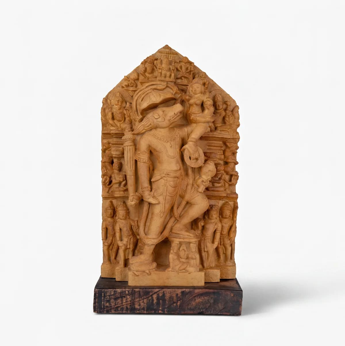 A full-front view of the Nar Varaha Sculpture, a detailed stone composite replica featuring intricate temple art carvings.
