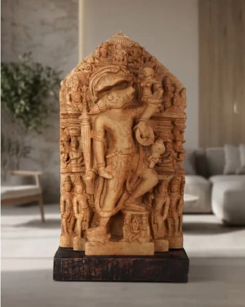 A front-facing view of the Nar Varaha Sculpture, a detailed stone composite replica showing the deity holding Bhudevi.