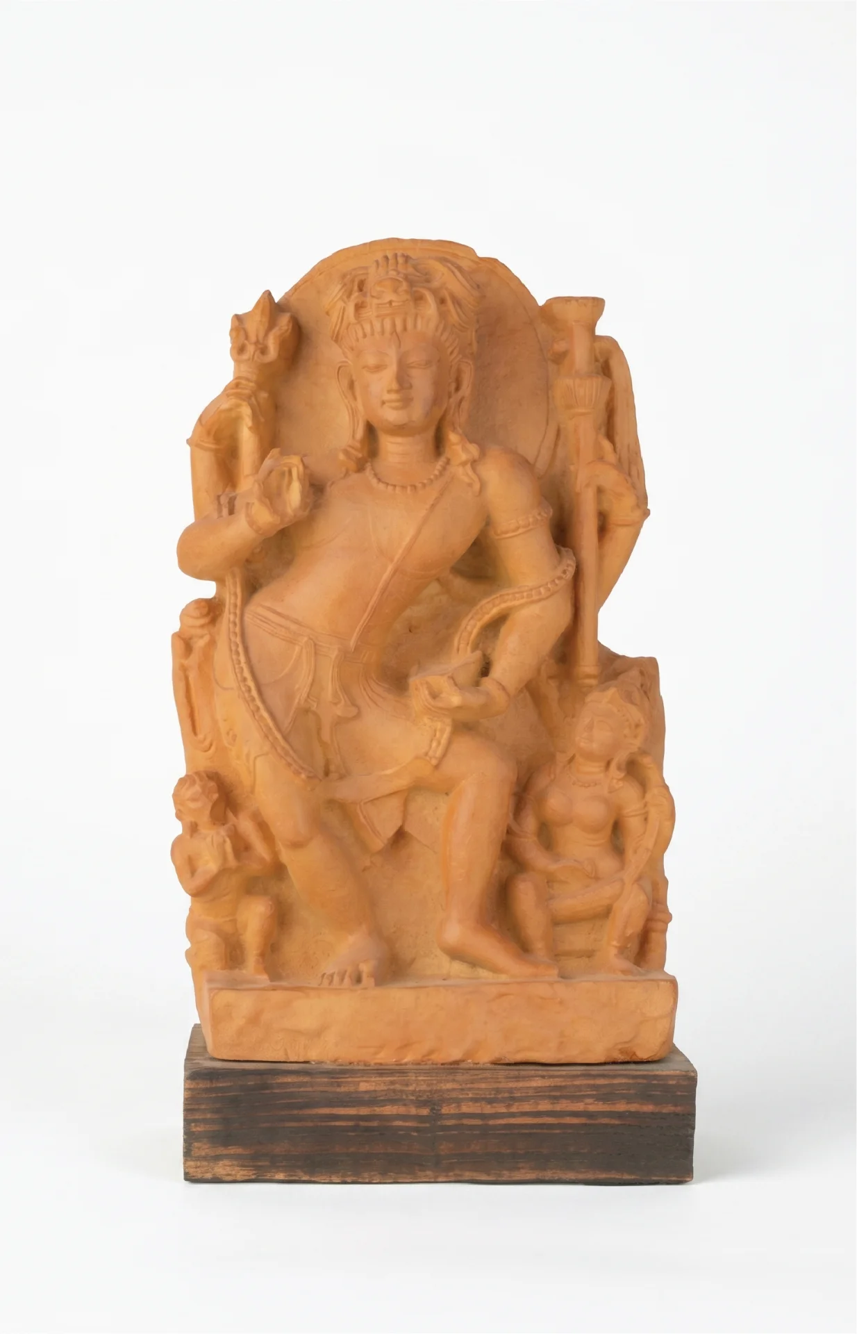 A full-front view of the Natesh Shiva Sculpture, a stone composite replica showing intricate dancing poses on a wooden base.