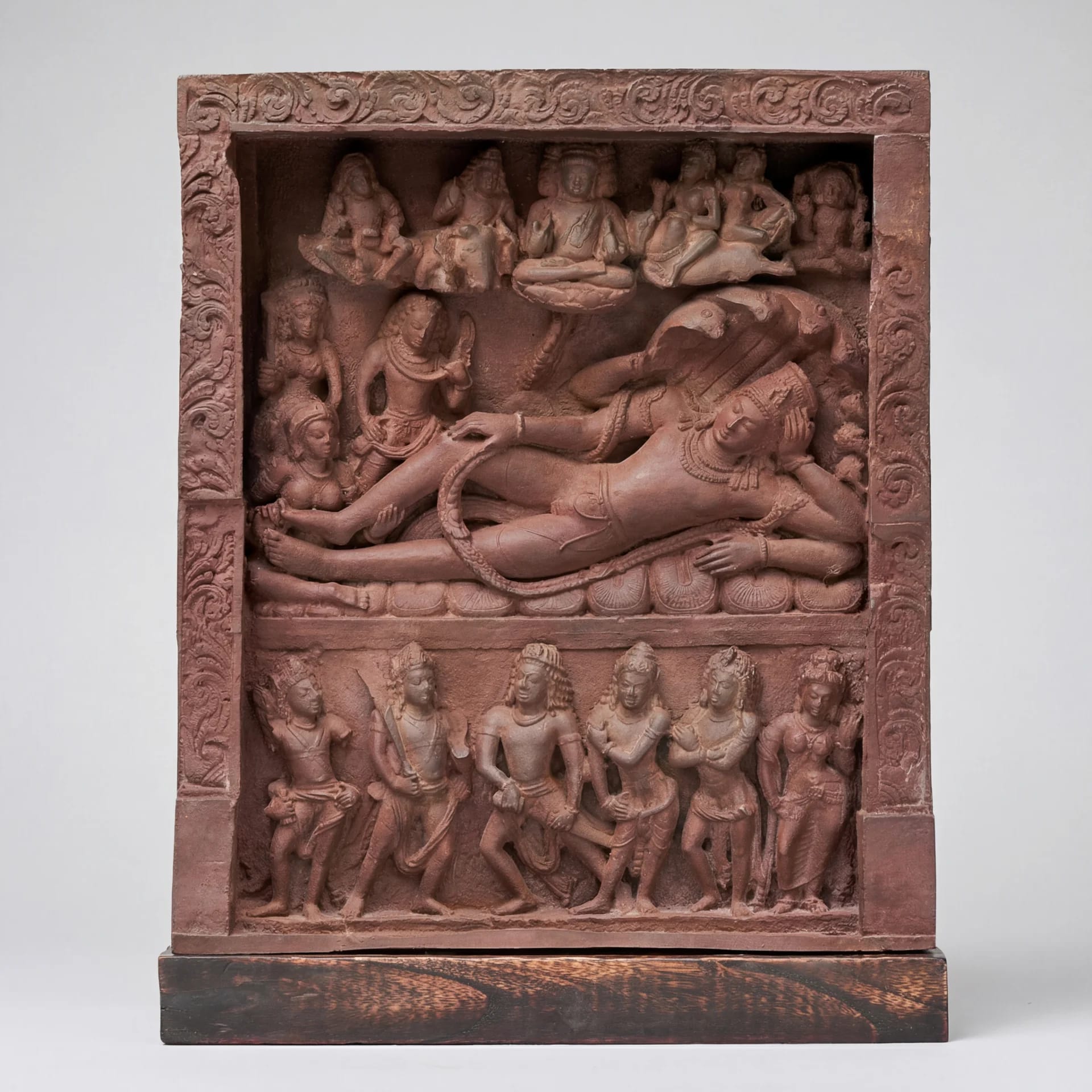 A front-facing view of the Anantasayana Vishnu Sculpture, a terracotta-style relief panel showing the deity reclining on a serpent.