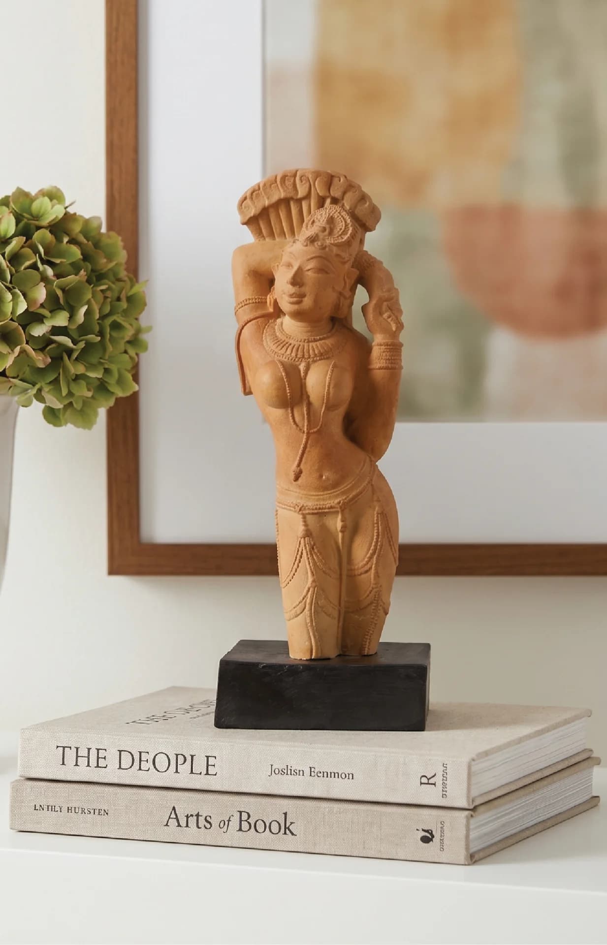 The Alasa Nayika Sculpture stands on a black base, showcasing intricate sandstone-style carving of a celestial woman in tribhanga pose.