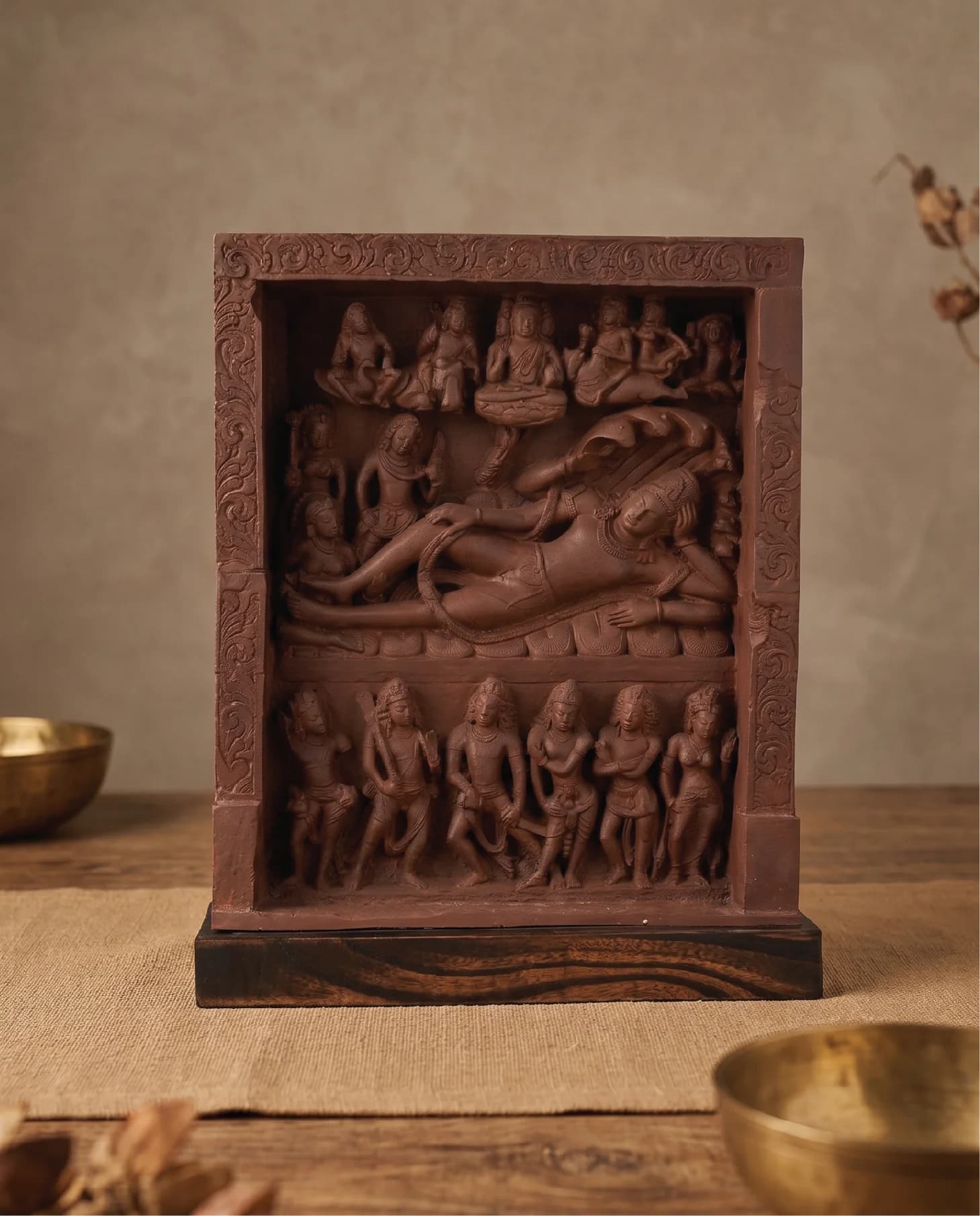 A front view of the Anantasayana Vishnu Sculpture, a terracotta-style relief panel depicting the deity reclining on a serpent.