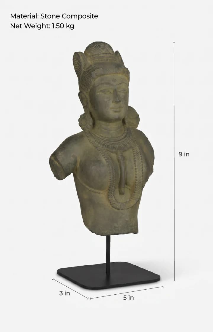A three-quarter view of the Female Figure Bust Sculpture, a stone composite replica featuring detailed Chola-style ornamentation.