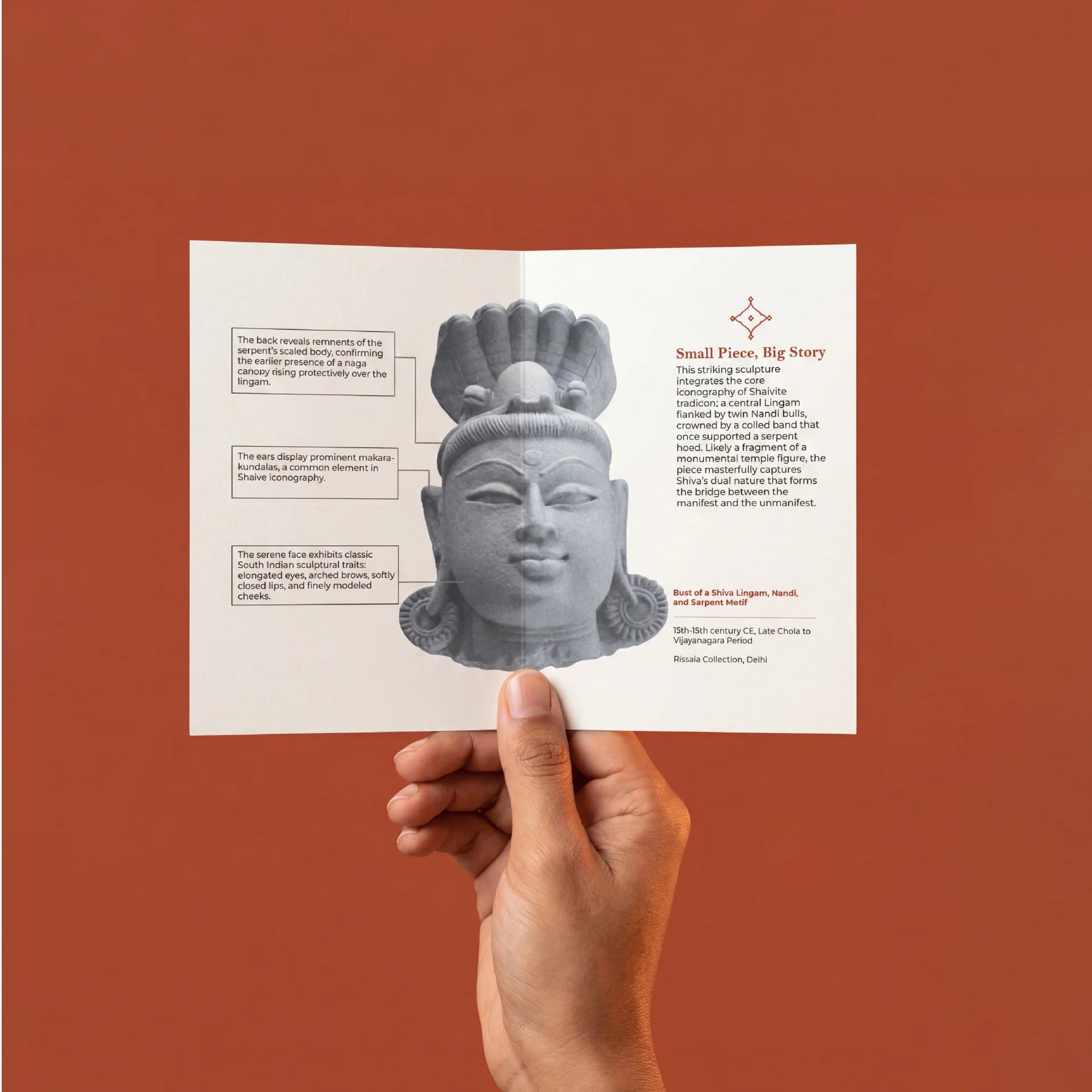 A hand holds an informational brochure featuring the Shiva Lingam with Nandi & Serpent stone composite replica with detailed annotations.