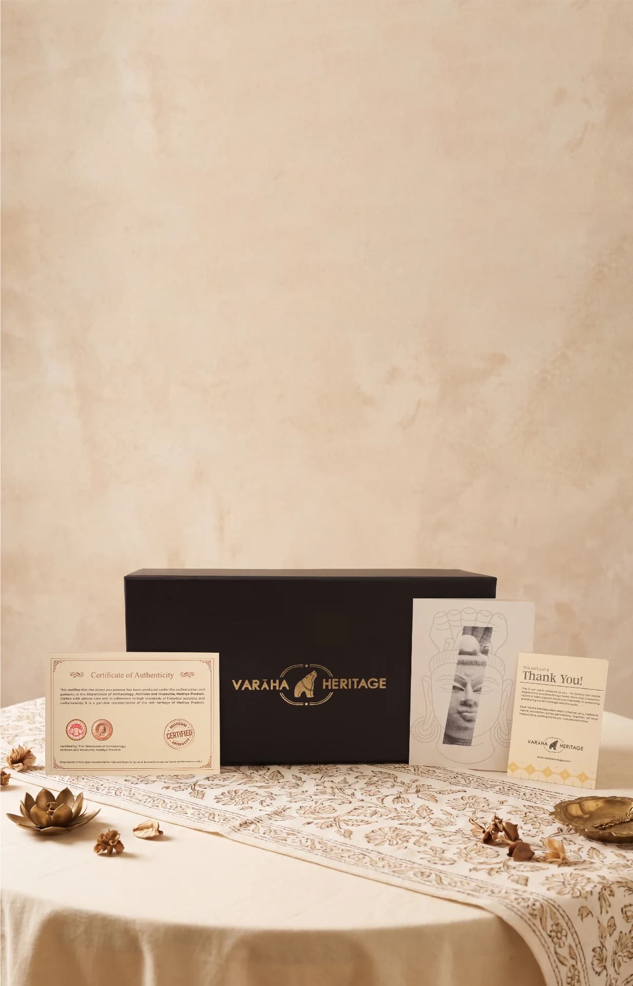The Shiva Lingam with Nandi & Serpent replica packaging box displayed with its certificate of authenticity and thank you card.