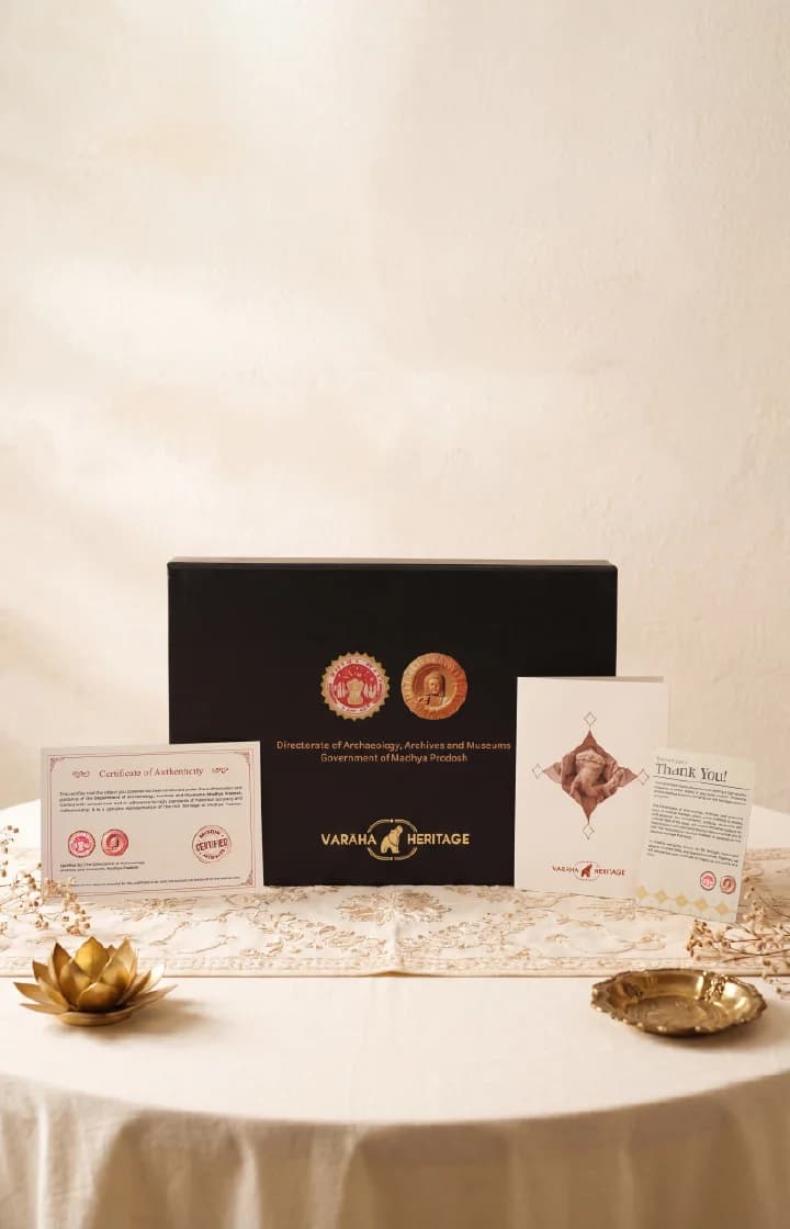 The Ganesha Sculpture packaging set includes a black presentation box, a certificate of authenticity, and a thank you card.