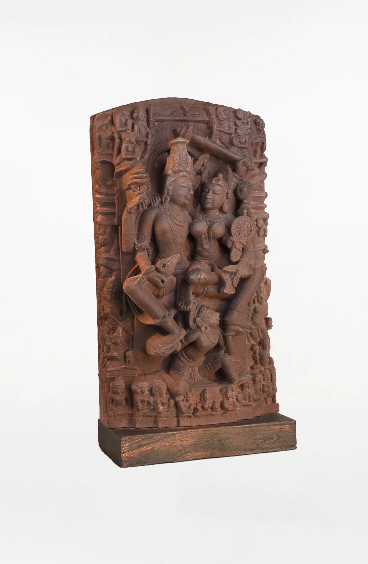A three-quarter view of the Lakshmi Narayan Sculpture, a hand-finished stone-style replica featuring intricate 12th-century relief carvings.