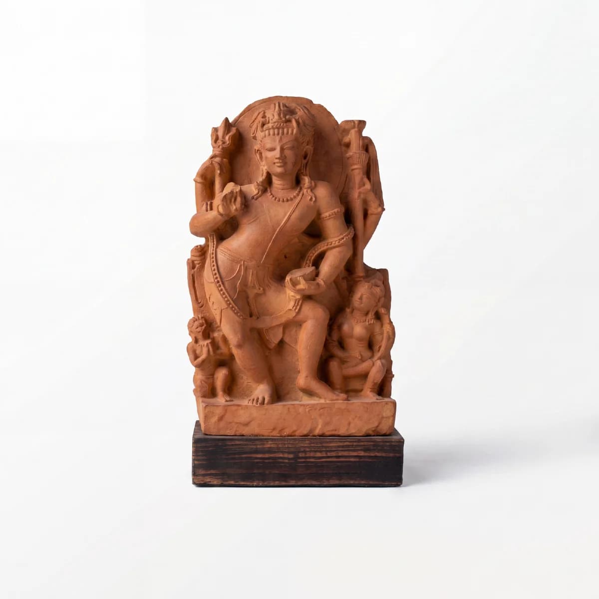 A front-facing view of the Natesh Shiva Sculpture, a stone composite replica featuring intricate carvings of the dancing deity.